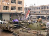Бороться с танками Асада сирийских повстанцев учат американцы, газета "Известия"